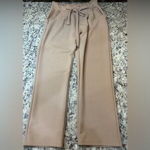 Elegant Women's Tan Trousers with Ruffle Trim